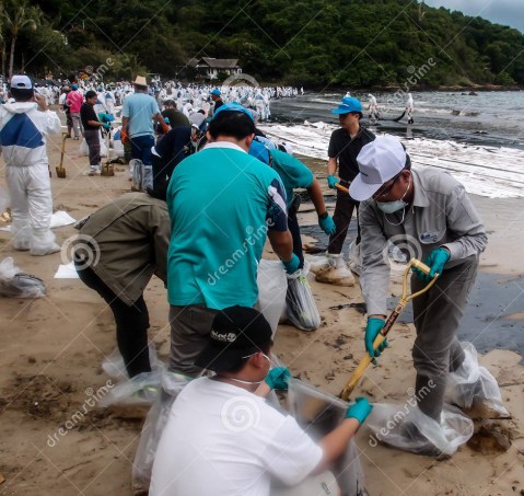 beach-clean-up-rayong-thailand-jul-people-clearing-contaminated-sand-aou-prow-jul-spilled-oil-came-32707287